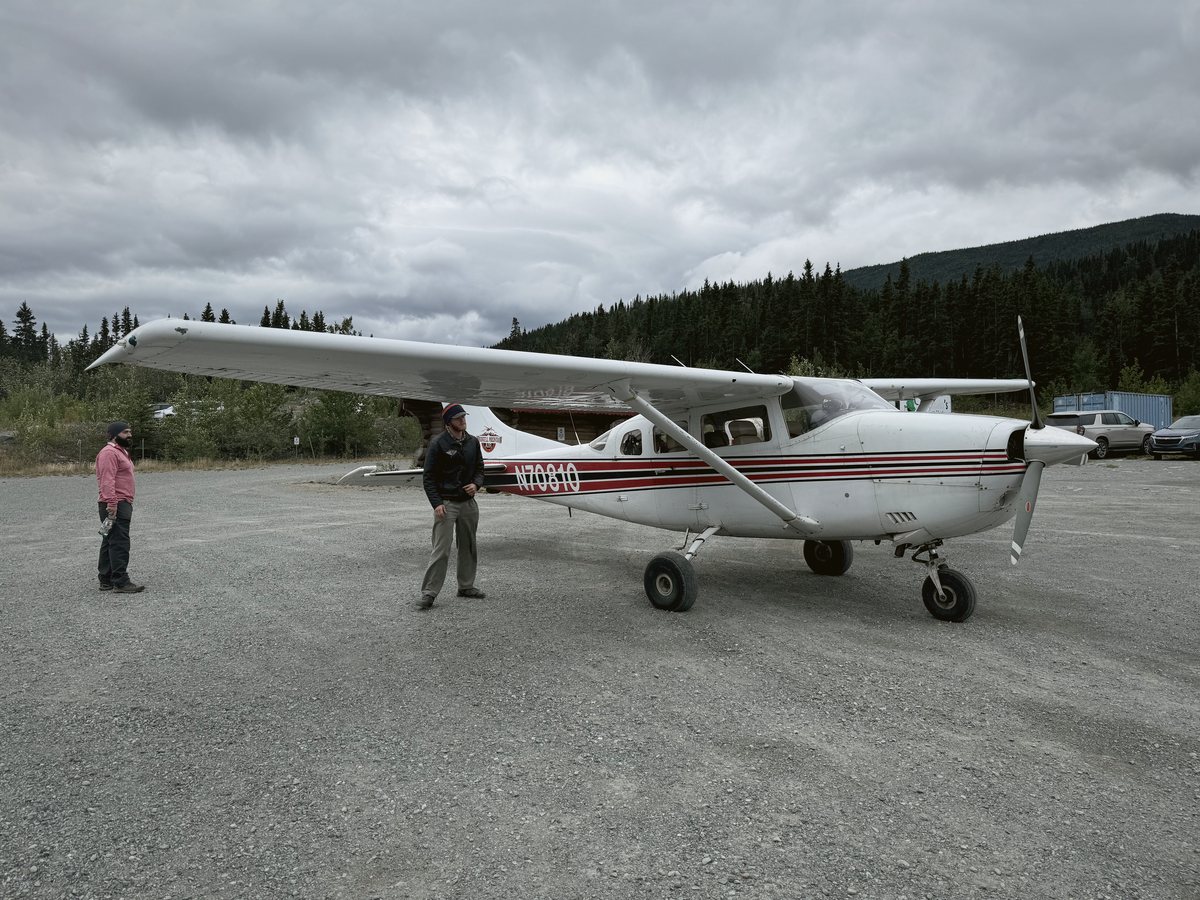 A red Cessna on the airstrip