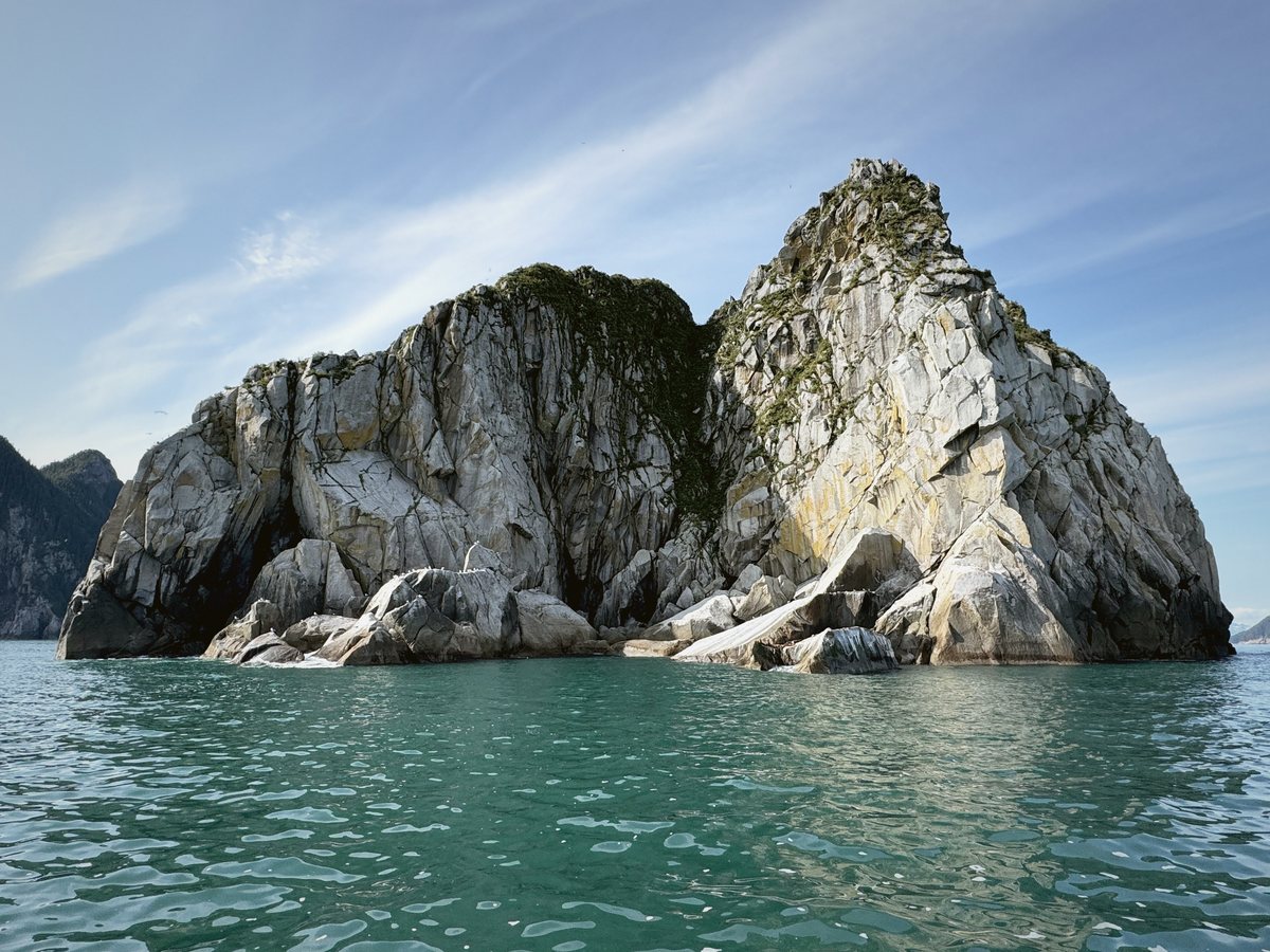 A sea stack in turquoise water