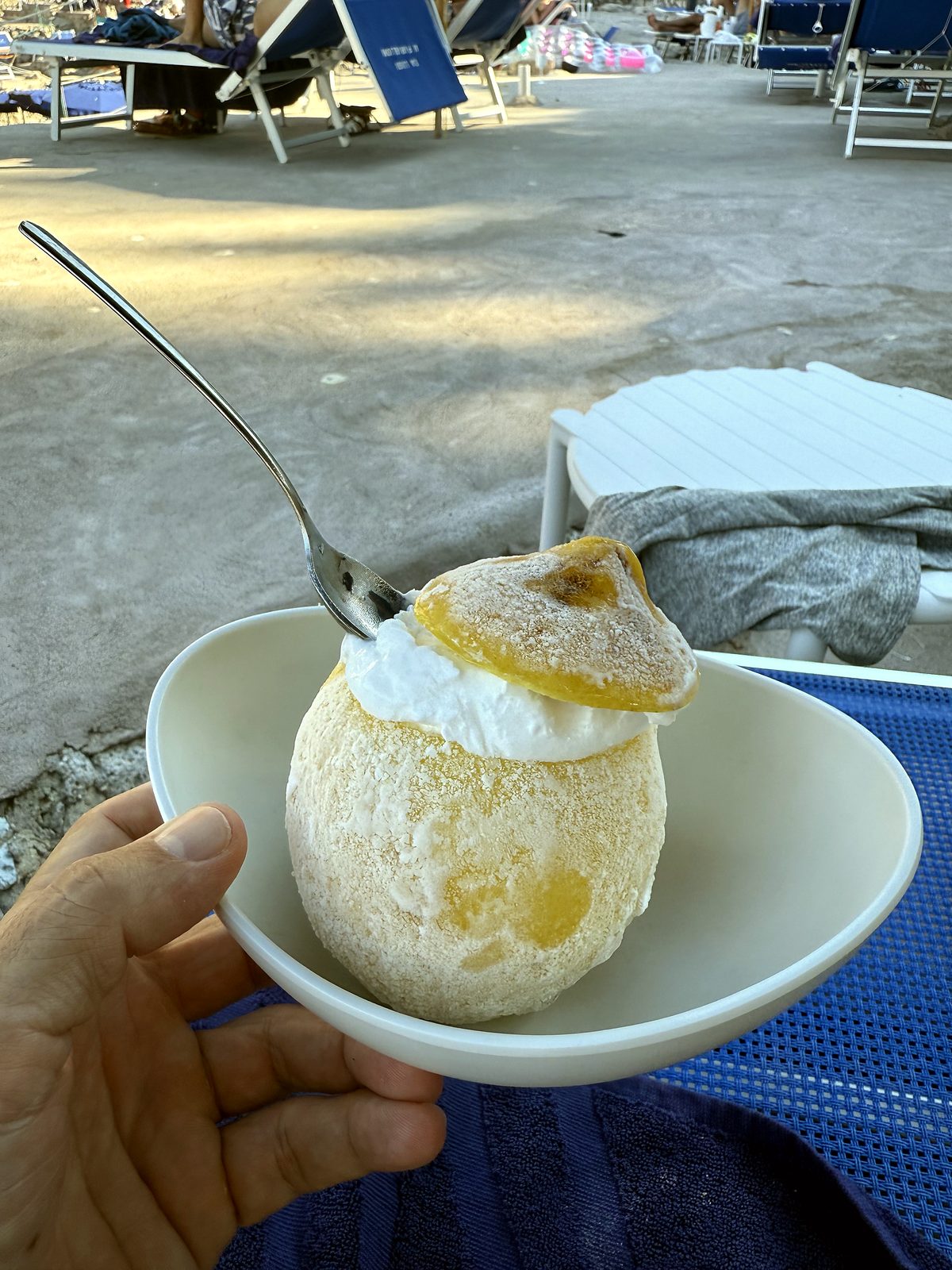 A lemon ice served in a lemon