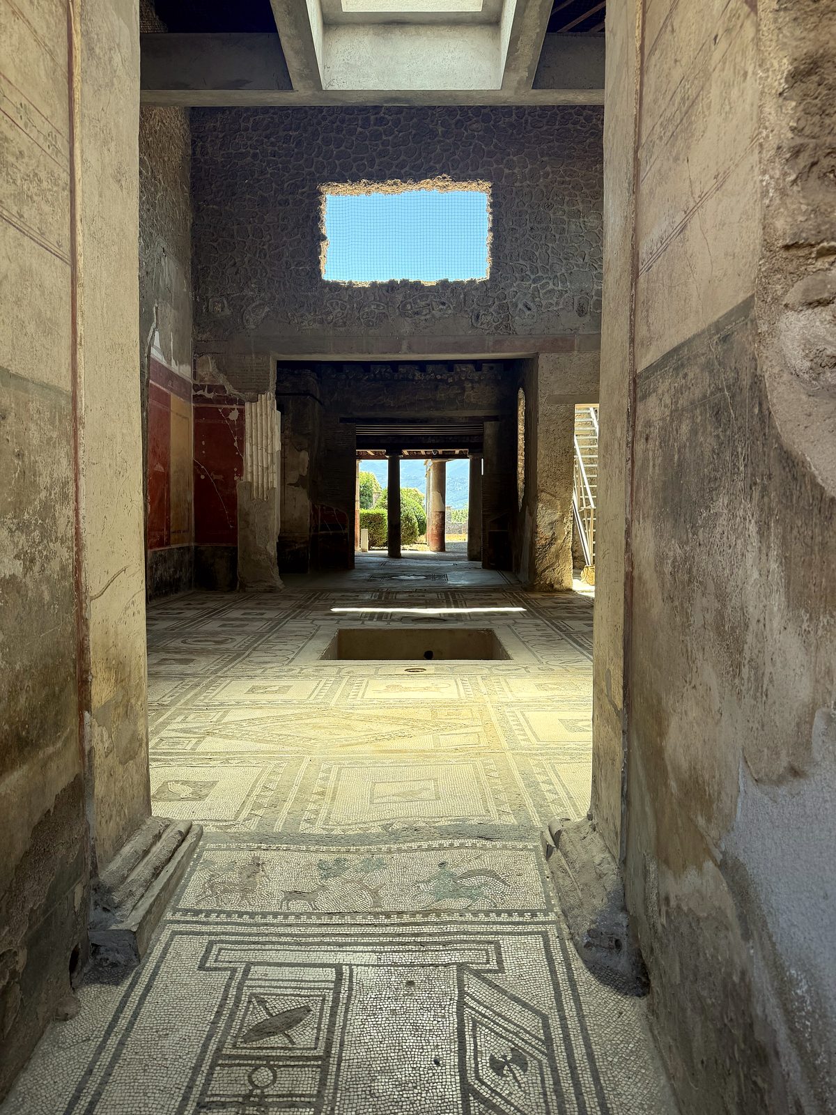A Pompeii house atrium with mosaic floors