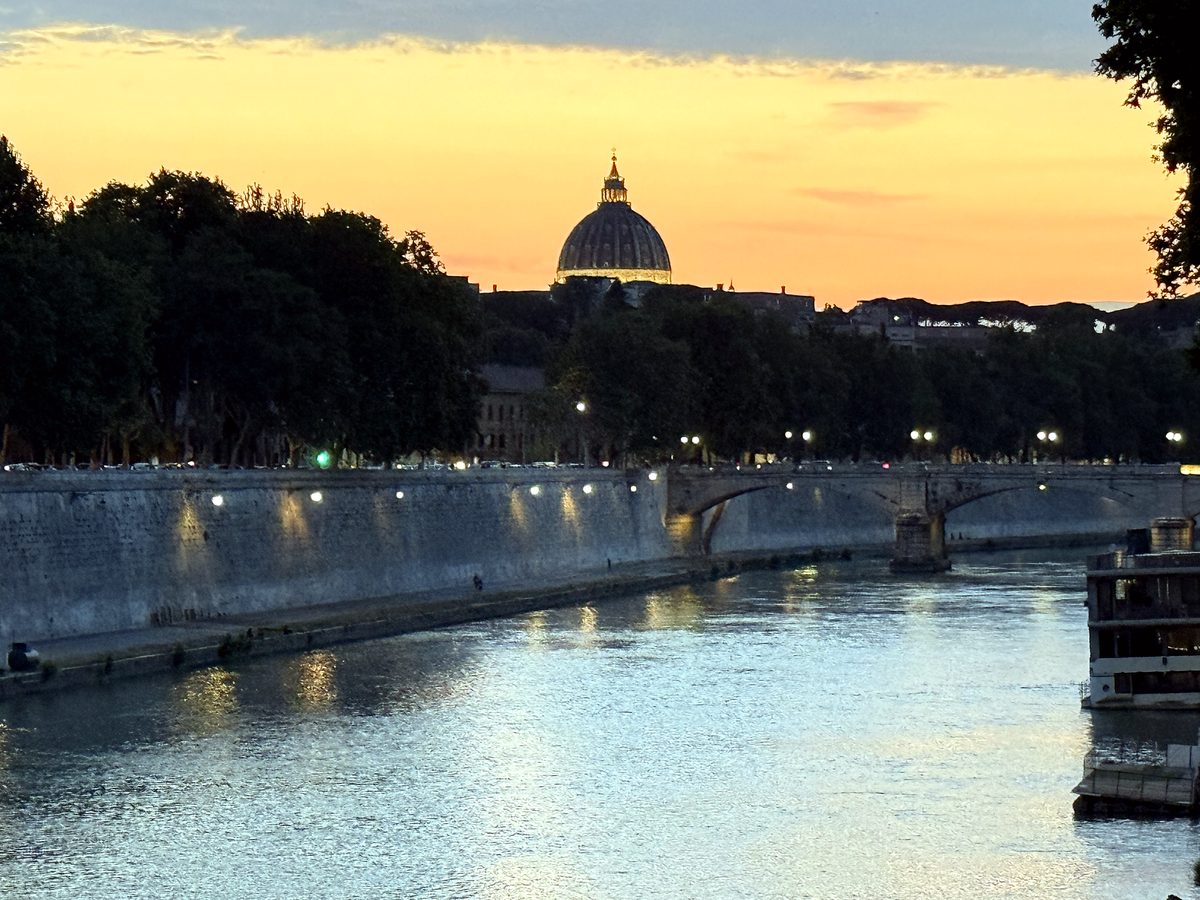 The Tiber at sunset with St. Peter’s dome