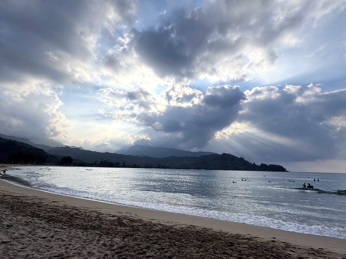 The half circle of Hanalei Bay with the mountains behind