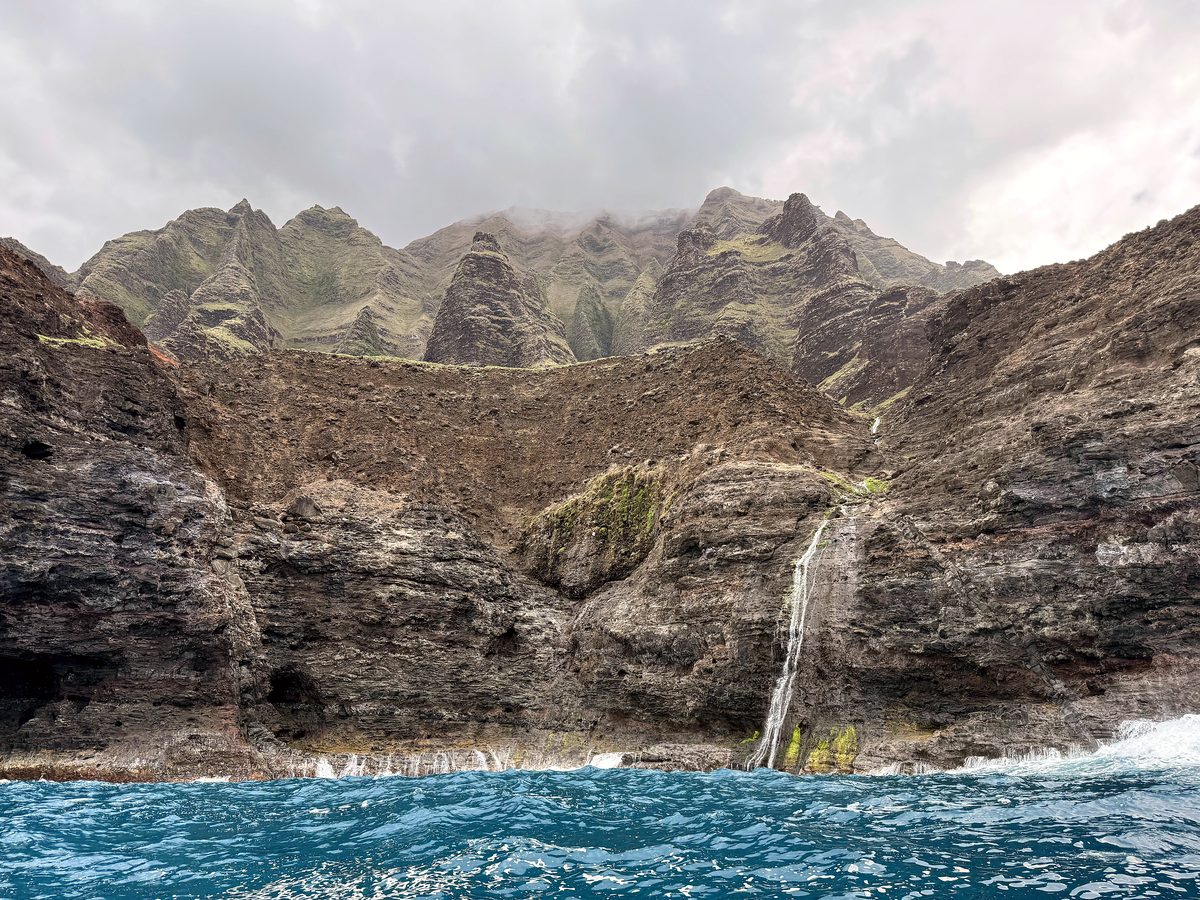 A waterfall on the Nā Pali coast