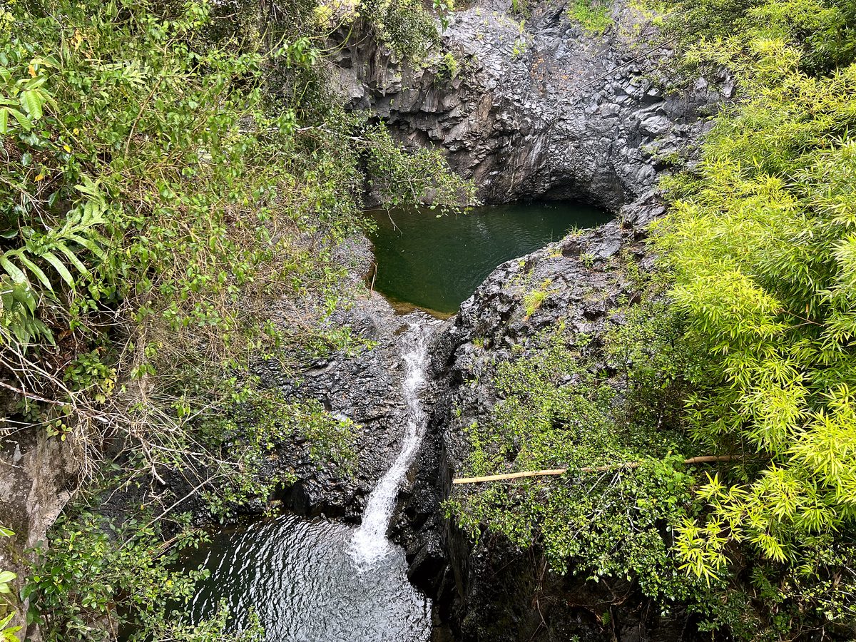 A waterfall dropping into a pool