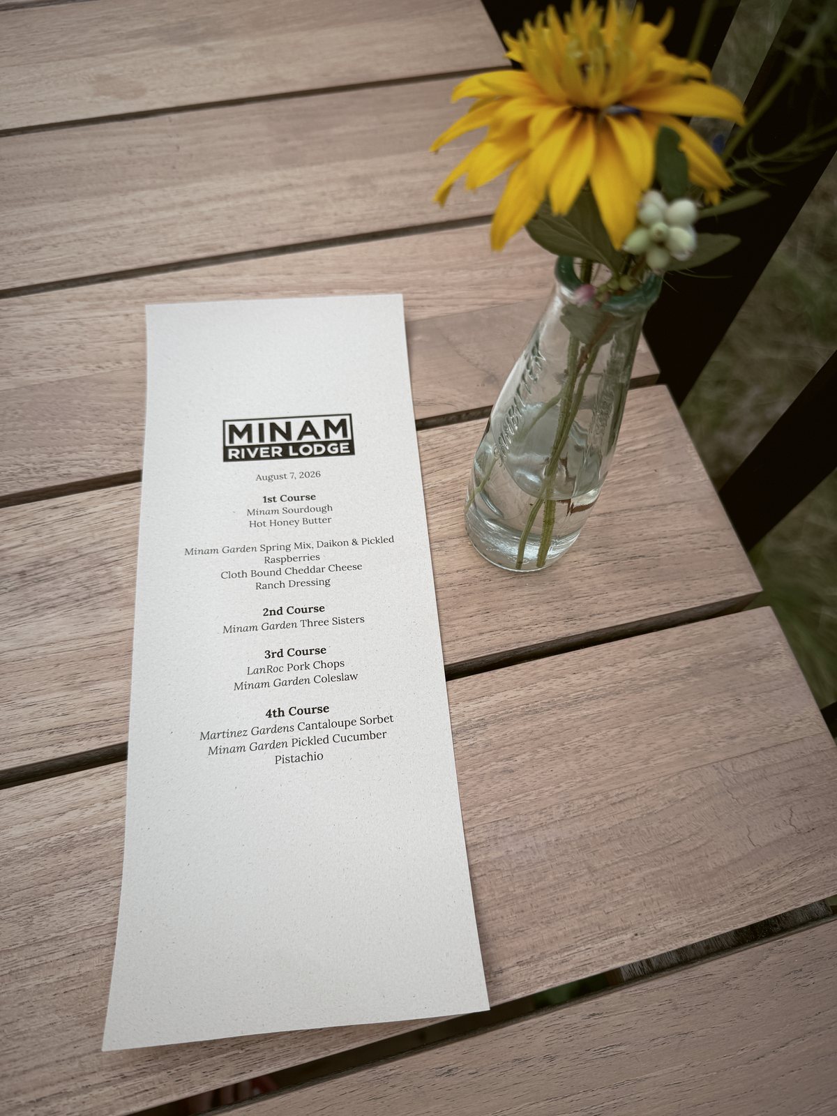 A dinner menu and a wildflower