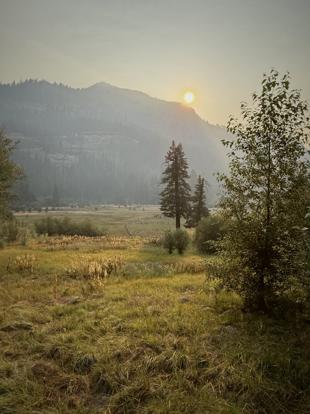 A smoky valley sunset